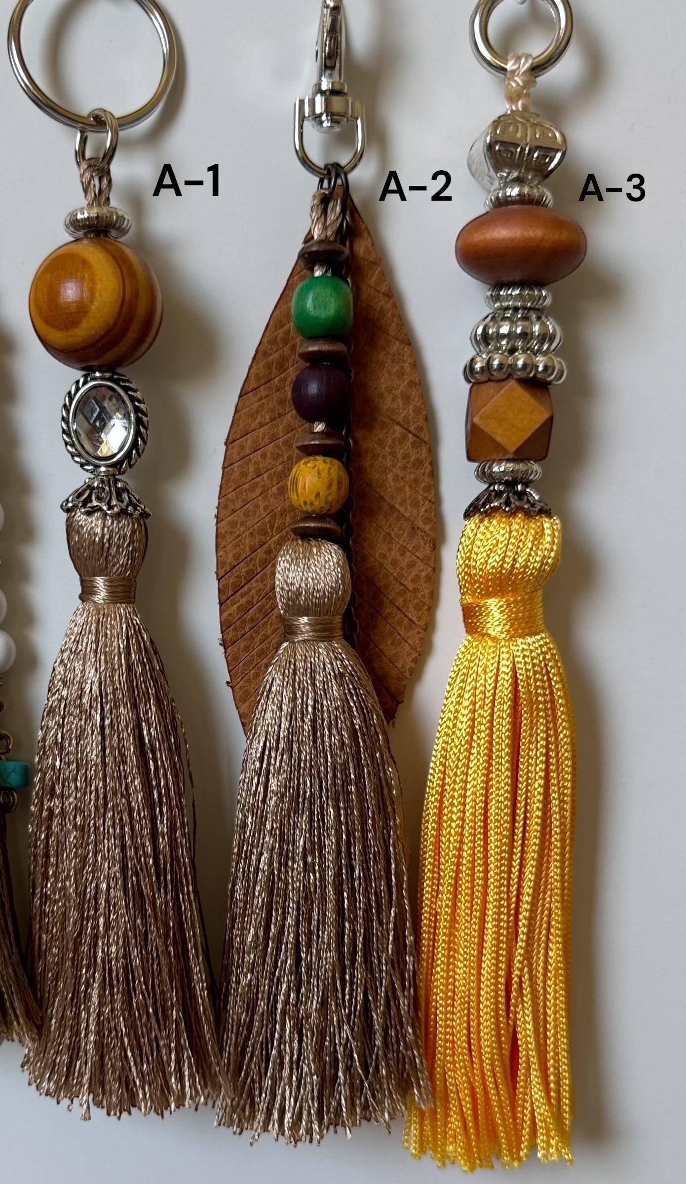Boho Tassel Bag Charms – Wooden Beads, Silk Tassels, Leather Feather – Keychain or Bag Accessory